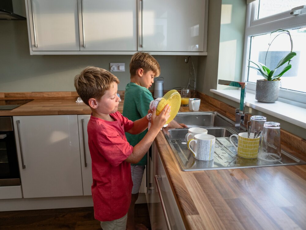 Kids doing the washing up