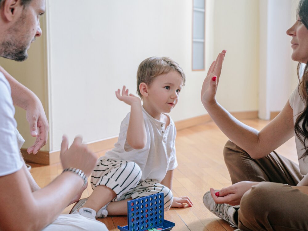 Family high fiving