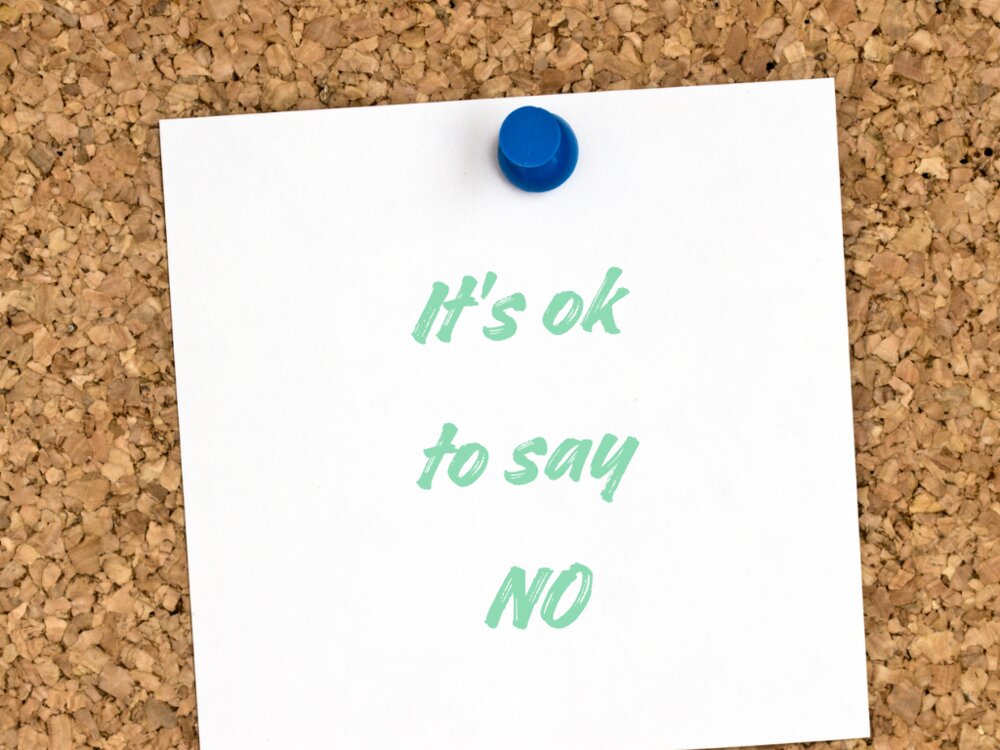 It's okay to say no written on paper