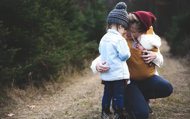 Mum with her kids in nature