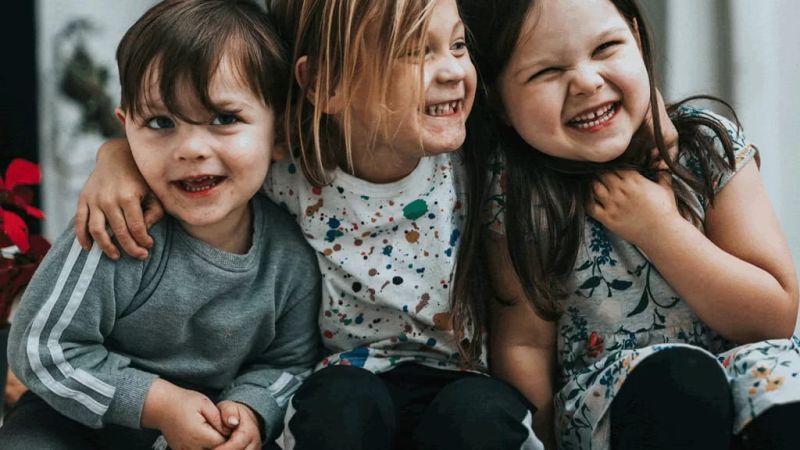 Three laughing kids